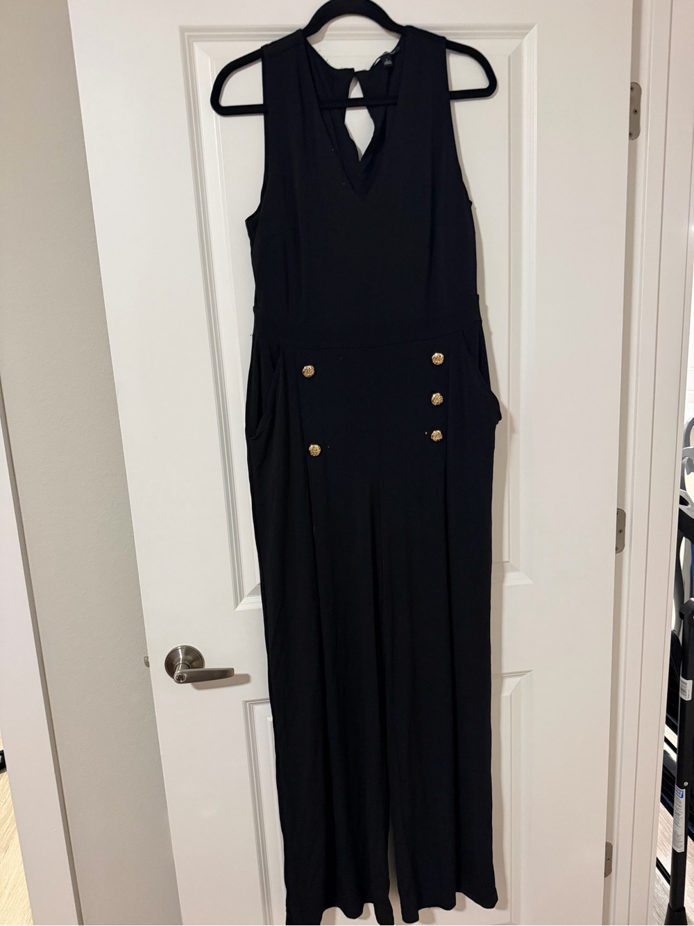 Sleeveless Black Jumpsuit with Gold Button Detail